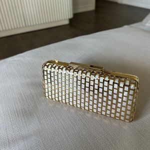 BCBG MaxAzria gold clutch